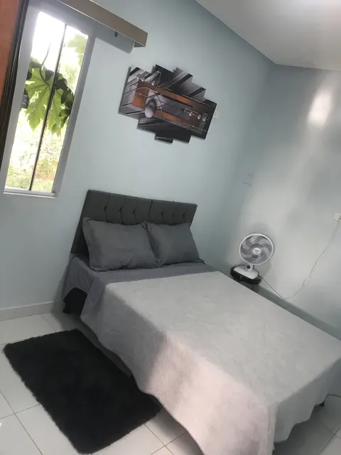 Outra vista da cama de casal do Quarto Duplo 01