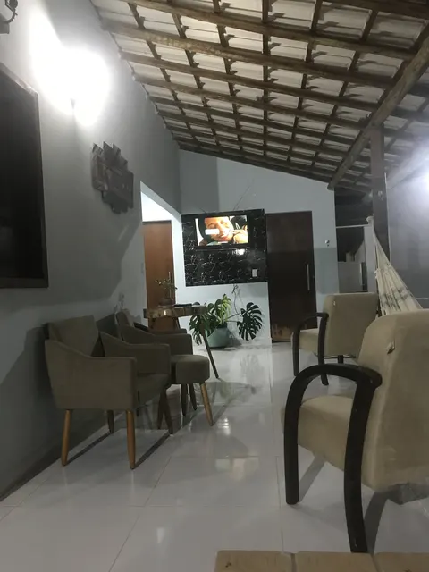 Varanda coberta e espaço de convivência do Quarto Duplo 01